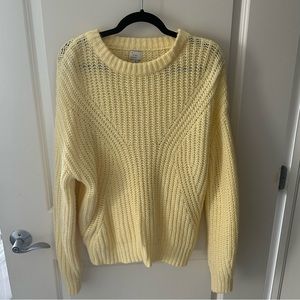 a new day yellow sweater